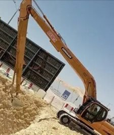 صورة اعلان : بوكلين بوم طويل حفار ذراع طويل