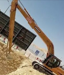 صورة اعلان : بوكلين بوم طويل حفار ذراع طويل